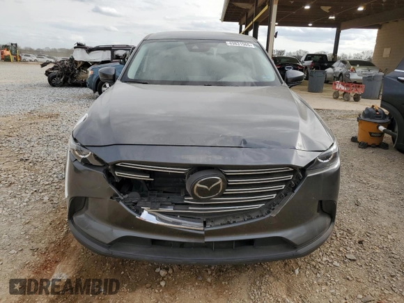 2022 Mazda CX-9 Touring with VIN JM3TCBCYXN0613680, listed as a Copart auction lot 49831565 with 121,891 mi miles and Salvage Title. Bid and sale history available at carsss.com. Image 5.