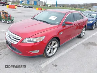 2010 Ford Taurus SHO with VIN 1FAHP2KT4AG122263, listed as a IAAI auction lot 41930902 with 128,977 mi miles and . Bid and sale history available at DreamBid. Image 2.