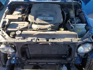 2015 Jeep Wrangler Unlimited Sport with VIN 1C4BJWDG1FL573349, listed as a Copart auction lot 86879394 with 96,773 mi miles and Salvage Title. Bid and sale history available at carsss.com. Image 11.