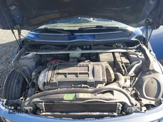 2005 MINI Convertible S with VIN WMWRH33455TF82408, listed as a IAAI auction lot 41857791 with 133,824 mi miles and . Bid and sale history available at DreamBid. Image 10.