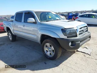 2007 Toyota Tacoma with VIN 3TMLU42N87M009716, listed as a IAAI auction lot 41768963 with 196,236 mi miles and . Bid and sale history available at DreamBid. Image 1.