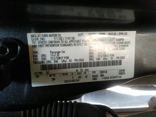 2014 Ford Focus Titanium with VIN 1FADP3J20EL236805, listed as a IAAI auction lot 41708437 with 105,724 mi miles. Bid and sale history available at carsss.com. Image 9.