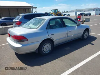 2002 Honda Accord LX with VIN 1HGCG56422A167829, listed as a IAAI auction lot 42401497 with 221,550 mi miles and . Bid and sale history available at DreamBid. Image 4.