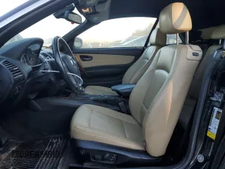 2010 BMW 1 Series 135i with VIN WBAUN9C55AVK41245, listed as a Copart auction lot 87690835 with 116,887 mi miles and Clean Title. Bid and sale history available at carsss.com. Image 7.
