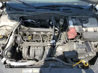 2010 Ford Fusion SE z VIN 3FAHP0HA7AR287260, wystawiony jako Copart lot #59298685 z przebiegiem 231 642 mil mil oraz Szkoda całkowita • Salvage title. Historia ofert i sprzedaży dostępna na DreamBid. Obrazek 11.
