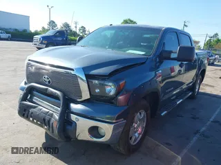 2010 Toyota Tundra with VIN 5TFEY5F11AX097360, listed as a IAAI auction lot 41990256 with 350,830 mi miles and . Bid and sale history available at DreamBid. Image 2.