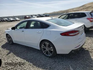 2019 Ford Fusion Titanium with VIN 3FA6P0D92KR184851, listed as a Copart auction lot 52154705 with 62,652 mi miles and Salvage Title. Bid and sale history available at carsss.com. Image 2.