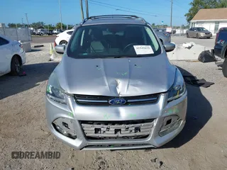 2016 Ford Escape Titanium with VIN 1FMCU0J94GUB11776, listed as a IAAI auction lot 41945655 with 119,949 mi miles. Bid and sale history available at carsss.com. Image 6.