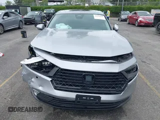 2024 Honda Accord Touring z VIN 1HGCY2F87RA082705, wystawiony jako IAAI lot #42194619 z przebiegiem 7 896 mil mil oraz . Historia ofert i sprzedaży dostępna na DreamBid. Obrazek 12.