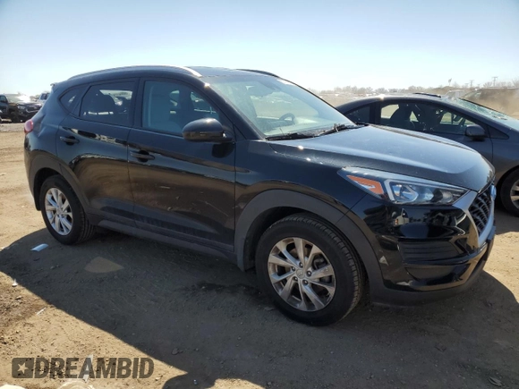 2019 Hyundai Tucson Value with VIN KM8J33A43KU888877, listed as a Copart auction lot 52191305 with 77,204 mi miles and Salvage title. Bid and sale history available at DreamBid. Image 4.