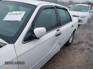 2001 Mercury Grand Marquis LS with VIN 2MEFM75W41X672360, listed as a IAAI auction lot 41418594 with 73,717 mi miles and . Bid and sale history available at DreamBid. Image 6.