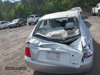 2005 Kia Spectra LX with VIN KNAFE121355203561, listed as a IAAI auction lot 41894533 with 32,889 mi miles. Bid and sale history available at carsss.com. Image 6.
