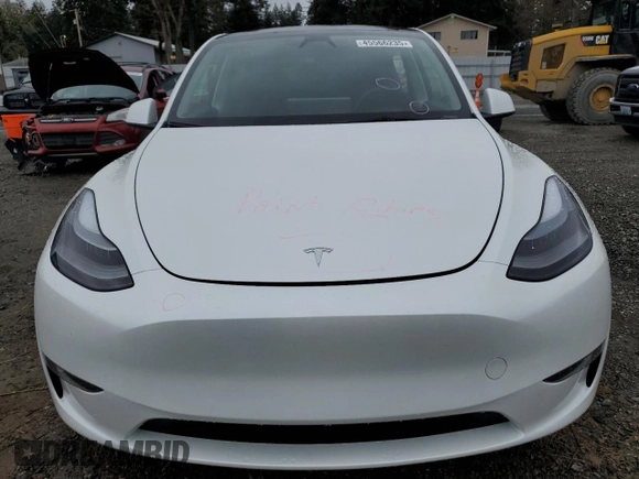 2023 Tesla Model Y Long Range z VIN 7SAYGDEE4PF836872, wystawiony jako Copart lot #45566235 z przebiegiem 7 674 mil mil oraz Szkoda całkowita • Salvage title. Historia ofert i sprzedaży dostępna na DreamBid. Obrazek 5.