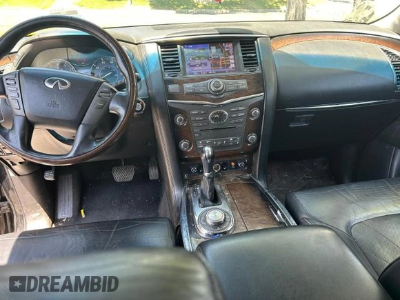 2014 Infiniti QX80 z VIN JN8AZ2NE6E9062908, wystawiony jako Copart lot #61263115 z przebiegiem 155 836 mil mil oraz Czysty tytuł • Clean title. Historia ofert i sprzedaży dostępna na DreamBid. Obrazek 9.