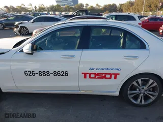 2015 Mercedes-Benz C-Class C 300 with VIN 55SWF4JB3FU074019, listed as a IAAI auction lot 40774389 with 104,091 mi miles. Bid and sale history available at carsss.com. Image 14.