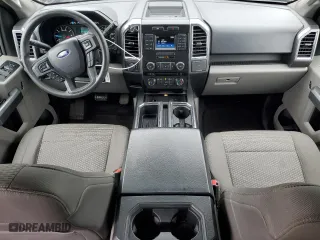 2015 Ford F-150 XLT w/HD Payload Pkg with VIN 1FTFW1EG0FFC08308, listed as a Copart auction lot 49697285 with 144,069 mi miles and Salvage Title. Bid and sale history available at carsss.com. Image 8.