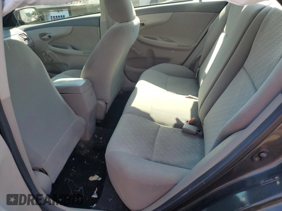 2010 Toyota Corolla z VIN 2T1BU4EE6AC217276, wystawiony jako Copart lot #62291275 z przebiegiem 66 516 mil mil oraz Szkoda całkowita • Salvage title. Historia ofert i sprzedaży dostępna na DreamBid. Obrazek 10.