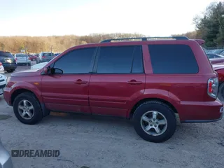 2006 Honda Pilot EX-L with VIN 5FNYF28586B005602, listed as a IAAI auction lot 41247326 with 221,698 mi miles and . Bid and sale history available at DreamBid. Image 14.