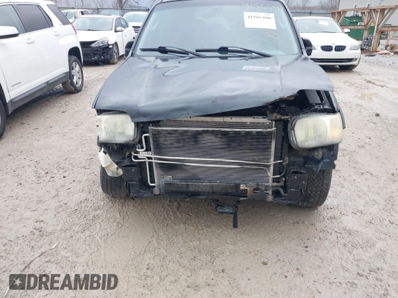 2004 Ford Escape Limited with VIN 1FMCU94124KA36321, listed as a IAAI auction lot 41565490 with 203,933 mi miles. Bid and sale history available at carsss.com. Image 6.
