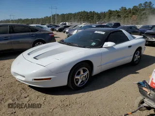 1997 Pontiac Firebird Trans Am z VIN 2G2FV22P5V2209729, wystawiony jako Copart lot #78074474 z przebiegiem 84 727 mil mil oraz Czysty tytuł • Clean title. Historia ofert i sprzedaży dostępna na DreamBid. Obrazek 1.