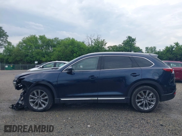 2021 Mazda CX-9 Carbon Edition z VIN JM3TCBDY7M0536005, wystawiony jako IAAI lot #42424129 z przebiegiem 48 005 mil mil oraz . Historia ofert i sprzedaży dostępna na DreamBid. Obrazek 15.