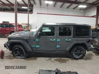 2021 Jeep Wrangler Unlimited Sport S with VIN 1C4HJXDN9MW819753, listed as a IAAI auction lot 41415569 with 43,263 mi miles and . Bid and sale history available at DreamBid. Image 14.