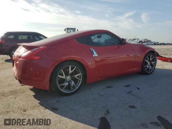 2014 Nissan 370Z with VIN JN1AZ4EHXEM631132, listed as a Copart auction lot 53753545 with 19,276 mi miles and Salvage Title. Bid and sale history available at carsss.com. Image 3.