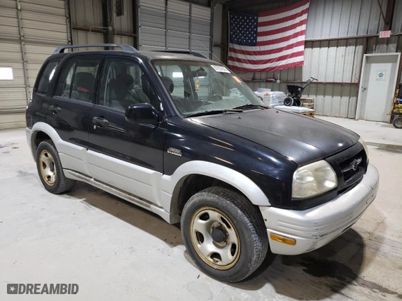 2000 Suzuki Grand Vitara JLX with VIN JS3TD62VXY4125624, listed as a Copart auction lot 87957045 with 175,923 mi miles and Salvage Title. Bid and sale history available at carsss.com. Image 4.