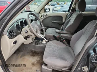 2003 Chrysler PT Cruiser with VIN 3C4FY48B23T556527, listed as a Copart auction lot 60886505 with 128,256 mi miles and Salvage title. Bid and sale history available at DreamBid. Image 7.