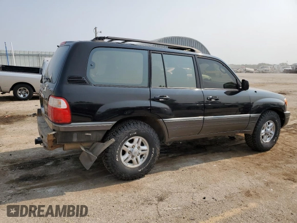 1998 Lexus LX 470 z VIN JT6HT00W0W0022045, wystawiony jako Copart lot #64022034 z przebiegiem 207 846 mil mil oraz Szkoda całkowita • Salvage title. Historia ofert i sprzedaży dostępna na DreamBid. Obrazek 3.