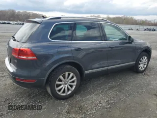 2012 Volkswagen Touareg Sport with VIN WVGEK9BP7CD006059, listed as a Copart auction lot 49411245 with 202,323 mi miles and Clean Title. Bid and sale history available at DreamBid. Image 3.