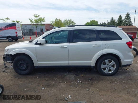 2012 Dodge Journey SXT with VIN 3C4PDCBG4CT372642, listed as a IAAI auction lot 42238499 with 172,033 mi miles and . Bid and sale history available at DreamBid. Image 15.
