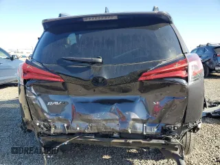 2017 Toyota RAV4 SE with VIN JTMNFREV0HJ706274, listed as a Copart auction lot 61437185 with 93,478 mi miles and Salvage title. Bid and sale history available at DreamBid. Image 6.