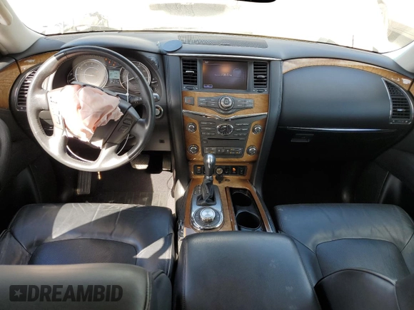 2012 Infiniti QX56 7-passenger with VIN JN8AZ2NE1C9021390, listed as a Copart auction lot 76475574 with 159,671 mi miles and Salvage Title. Bid and sale history available at carsss.com. Image 8.