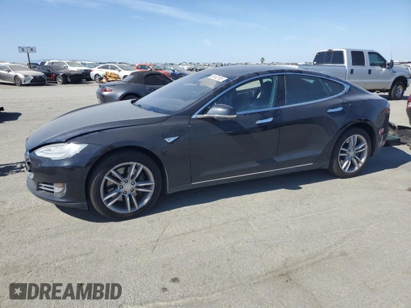 2016 Tesla Model S 90D with VIN 5YJSA1E2XGF129106, listed as a Copart auction lot 59162185 with 136,004 mi miles and Salvage title. Bid and sale history available at DreamBid. Image 1.