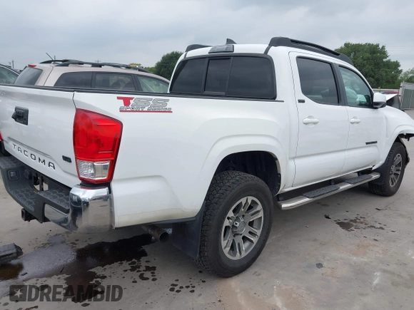2016 Toyota Tacoma SR5 z VIN 5TFAZ5CN5GX018977, wystawiony jako IAAI lot #42303122 z przebiegiem 99 545 mil mil oraz . Historia ofert i sprzedaży dostępna na DreamBid. Obrazek 4.