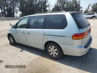 2004 Honda Odyssey EX z VIN 5FNRL18604B080100, wystawiony jako Copart lot #53924755 z przebiegiem 240 913 mil mil oraz Szkoda całkowita • Salvage title. Historia ofert i sprzedaży dostępna na DreamBid. Obrazek 2.