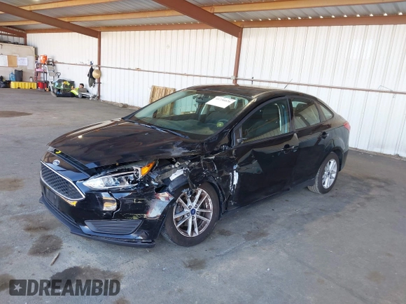 2017 Ford Focus SE with VIN 1FADP3F26HL219875, listed as a IAAI auction lot 41756026 with 70,493 mi miles. Bid and sale history available at carsss.com. Image 2.