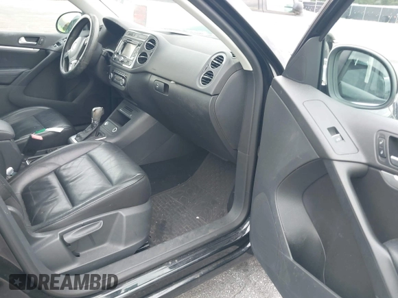 2012 Volkswagen Tiguan S with VIN WVGBV7AX6CW592242, listed as a IAAI auction lot 42215240 with 158,852 mi miles and . Bid and sale history available at DreamBid. Image 5.