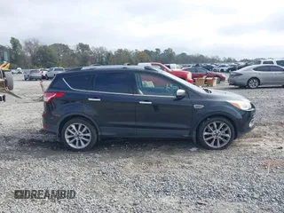 2014 Ford Escape SE with VIN 1FMCU0G9XEUE35271, listed as a IAAI auction lot 40896477 with 139,444 mi miles. Bid and sale history available at carsss.com. Image 13.