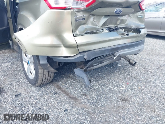 2013 Ford Escape SE с VIN 1FMCU9GXXDUC09846, выставлен на аукционе IAAI как лот 41925442 с пробегом 124 597 миль миль и . История ставок и продаж доступна на DreamBid. Изображение 6.