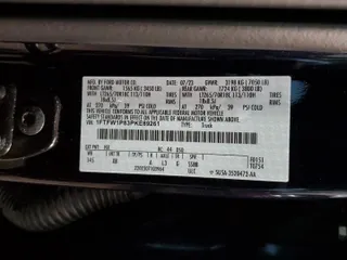 2023 Ford F-150 with VIN 1FTFW1P83PKE89261, listed as a Copart auction lot 46786025 with 9,079 mi miles and Salvage title. Bid and sale history available at DreamBid. Image 13.