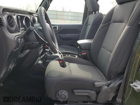 2023 Jeep Wrangler Sport S with VIN 1C4HJXDG0PW629815, listed as a Copart auction lot 53826875 with 9,260 mi miles and Salvage Title. Bid and sale history available at DreamBid. Image 7.