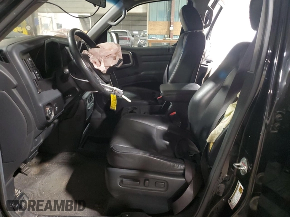 2010 Honda Ridgeline RTL with VIN 5FPYK1F5XAB011944, listed as a Copart auction lot 52434175 with 137,585 mi miles and Salvage title. Bid and sale history available at DreamBid. Image 7.