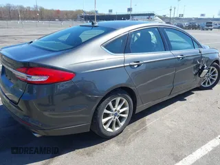 2017 Ford Fusion SE with VIN 3FA6P0H70HR107252, listed as a IAAI auction lot 42041332 with 121,255 mi miles. Bid and sale history available at carsss.com. Image 4.