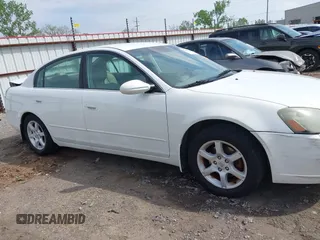 2006 Nissan Altima S with VIN 1N4AL11D76N429043, listed as a IAAI auction lot 42061407 with 163,528 mi miles and . Bid and sale history available at DreamBid. Image 13.
