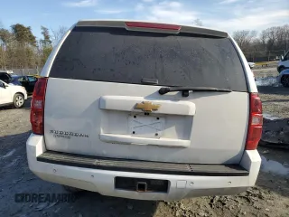 2013 Chevrolet Suburban LT with VIN 1GNSKJE74DR239851, listed as a Copart auction lot 44856425 with 203,074 mi miles and Salvage Title. Bid and sale history available at DreamBid. Image 6.