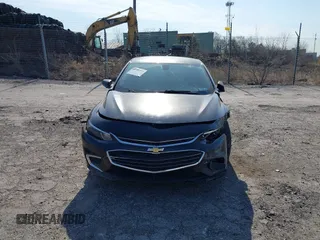 2016 Chevrolet Malibu LS z VIN 1G1ZB5STXGF172283, wystawiony jako IAAI lot #41785710 z przebiegiem 93 076 mil mil oraz . Historia ofert i sprzedaży dostępna na DreamBid. Obrazek 11.