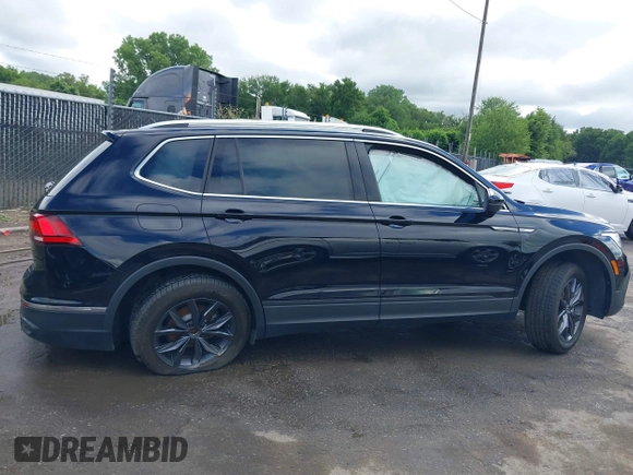 2023 Volkswagen Tiguan SE with VIN 3VV3B7AX4PM136264, listed as a IAAI auction lot 39724241 with 8,774 mi miles and . Bid and sale history available at DreamBid. Image 14.