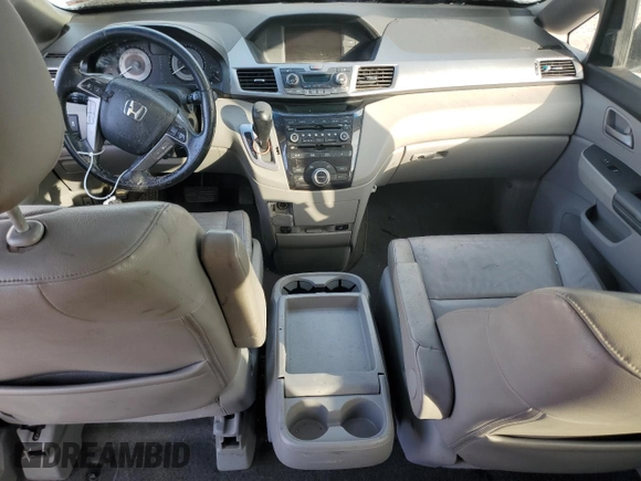 2012 Honda Odyssey Touring with VIN 5FNRL5H9XCB022284, listed as a Copart auction lot 82766824 with Not provided miles and Salvage title. Bid and sale history available at DreamBid. Image 8.